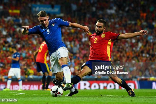 Andrea Belotti of Italy competes for the ball with Daniel Carvajal of Spain during the FIFA 2018 World Cup Qualifier between Spain and Italy at...