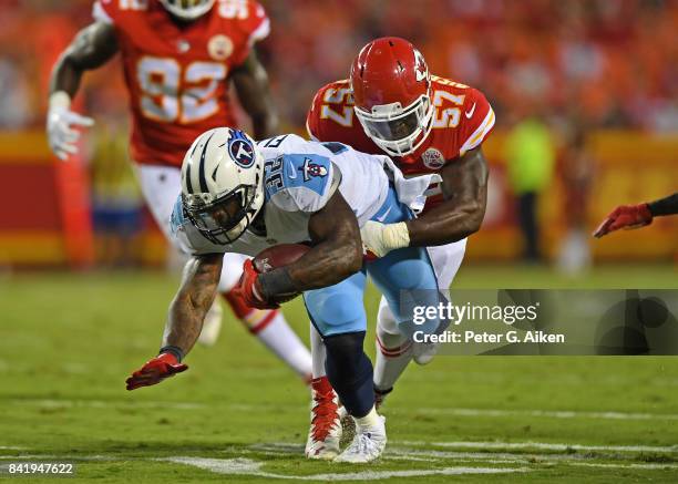 Linebacker Kevin Pierre-Louis of the Kansas City Chiefs tackles running back David Fluellen of the Tennessee Titans during the first half of a...