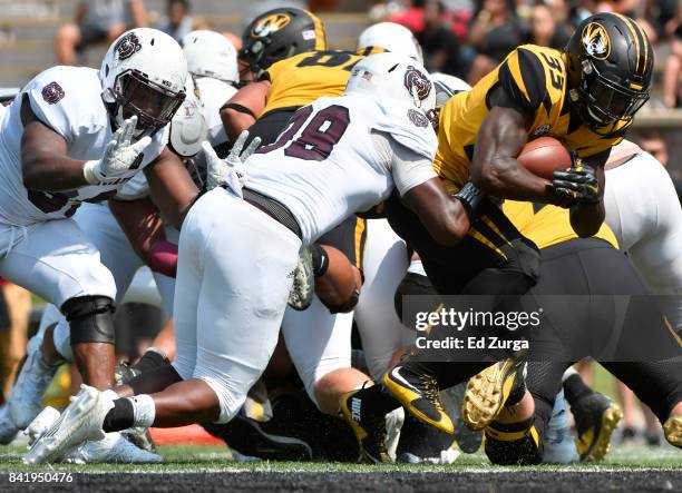 Larry Roundtree III of the Missouri Tigers goes in for a touchdown against Eric Greely of the Missouri State Bears in the fourth quarter at Memorial...