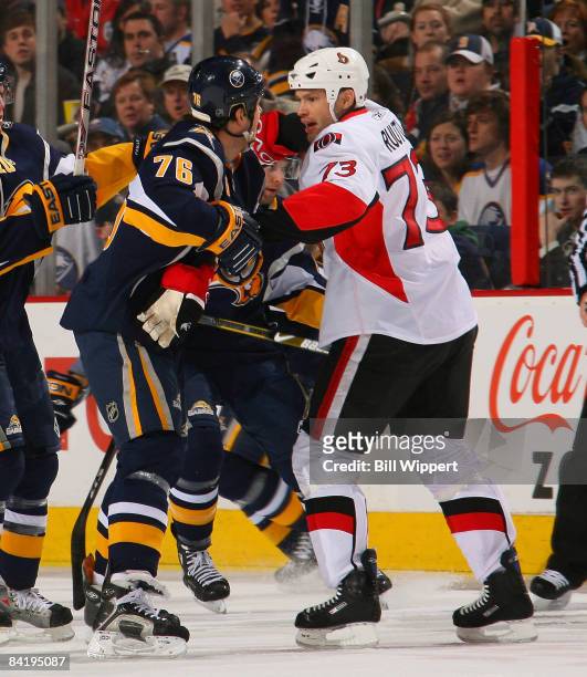 Andrew Peters of the Buffalo Sabres scuffles with Jarkko Ruutu of the Ottawa Senators on January 6, 2009 at HSBC Arena in Buffalo, New York. Peters...
