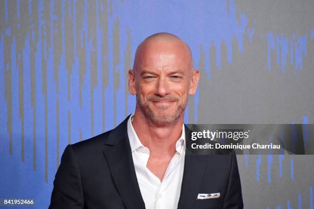 Filippo Nigro walks the red carpet ahead of the 'Suburra. La Serie' screening during the 74th Venice Film Festival at Sala Giardino on September 2,...