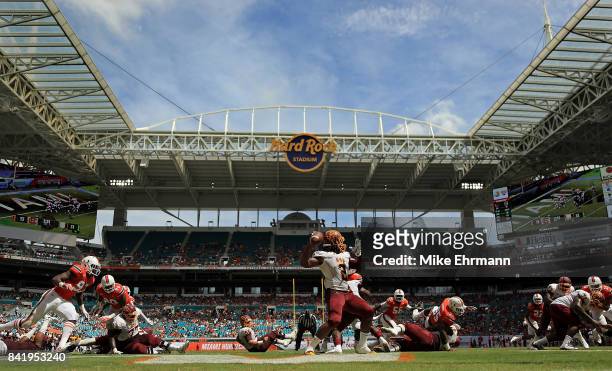 Larry Brihm Jr. #2 of the Bethune Cookman Wildcats passes during a game against the Miami Hurricanes at Hard Rock Stadium on September 2, 2017 in...