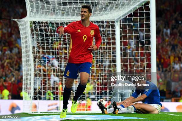 Alvaro Morata of Spain celebrates after scoring his team's third goal during the FIFA 2018 World Cup Qualifier between Spain and Italy at Estadio...