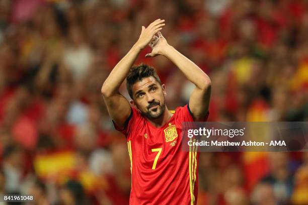 David Villa of Spain salutes the crowd during the FIFA 2018 World Cup Qualifier between Spain and Italy at Estadio Santiago Bernabeu on September 2,...