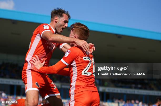 Alex Rodman of Shrewsbury Town celebrates after he scores with Jon Nolan of Shrewsbury Town during the Sky Bet League One match between Gillingham...