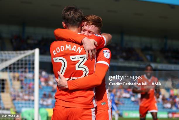 Jon Nolan of Shrewsbury Town celebrates with Alex Rodman of Shrewsbury Town during the Sky Bet League One match between Gillingham and Shrewsbury...