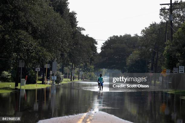 Neighborhood is inundated with floodwater after torrential rains pounded Southeast Texas following Hurricane and Tropical Storm Harvey causing...