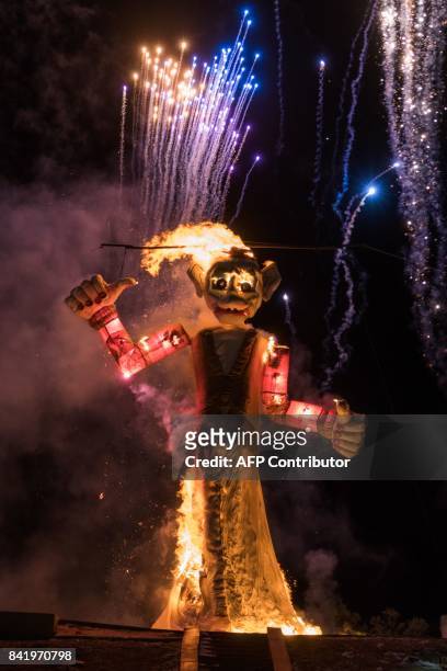 The marionette of Zozobra is pictured ablaze at Fort Marcy Park in Santa Fe, New Mexico on September 1, 2017. Every year the Santa Fe Kiwanis club...