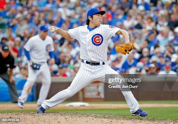 Koji Uehara of the Chicago Cubs pitches against the Atlanta Braves during the seventh inning at Wrigley Field on September 2, 2017 in Chicago,...