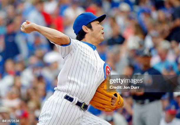 Koji Uehara of the Chicago Cubs pitches against the Atlanta Braves during the seventh inning at Wrigley Field on September 2, 2017 in Chicago,...