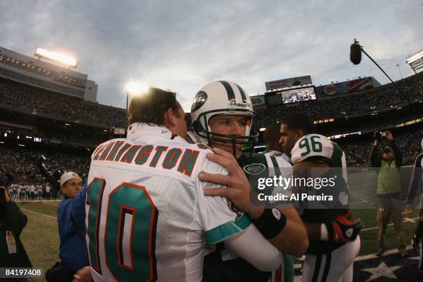 Quarterback Chad Pennington the Miami Dolphins meets with Quarterback Brett Favre of the New York Jets on December 28, 2008 at Giants Stadium, East...