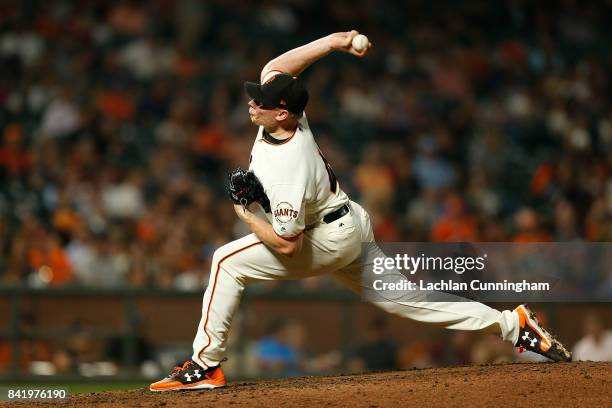 Mark Melancon of the San Francisco Giants pitches in the eighth inning against the St Louis Cardinals at AT&T Park on August 31, 2017 in San...