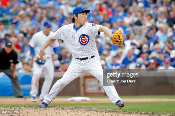 Koji Uehara of the Chicago Cubs pitches against the Atlanta Braves during the seventh inning at Wrigley Field on September 2, 2017 in Chicago,...