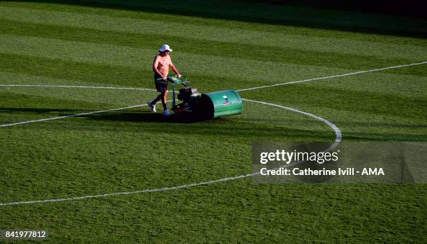 Ground staff mow the pitch after the Sky Bet League One match between Gillingham and Shrewsbury Town at Priestfield Stadium on September 2, 2017 in...