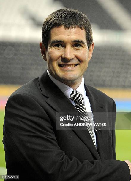 Nigel Clough, new manager of Derby County football club, poses for photographers on the pitch before a League cup semi final first leg football match...