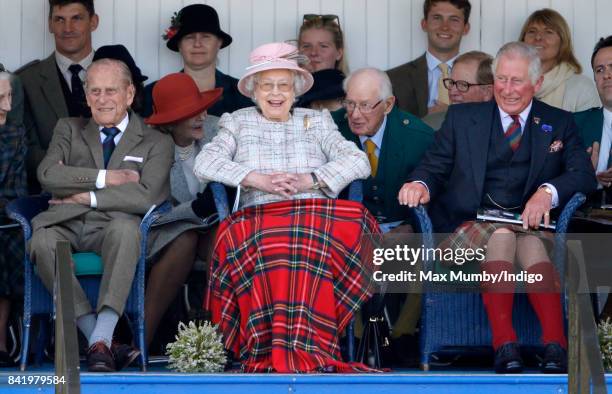 Prince Philip, Duke of Edinburgh, Queen Elizabeth II and Prince Charles, Prince of Wales attend the 2017 Braemar Gathering at The Princess Royal and...