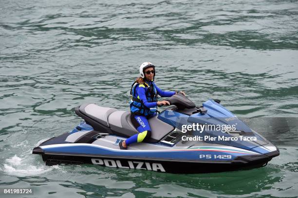 General view of security, a policeman on a water bike on the lake during the Ambrosetti International Economic Forum on September 2, 2017 in...