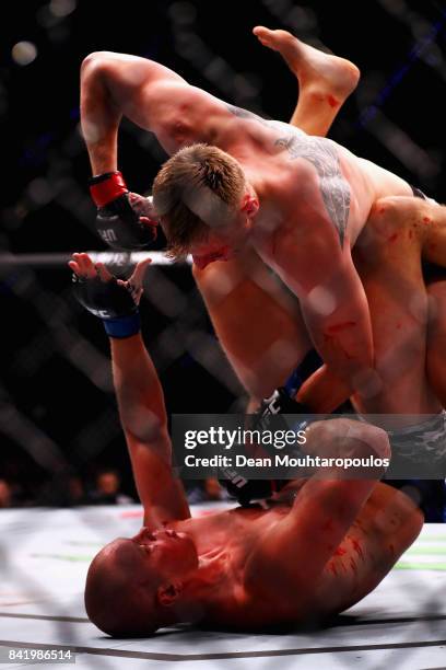 Alexander Volkov of Russia and Stefan Struve of the Netherlands compete in their Heavyweight bout during the UFC Fight Night at Ahoy on September 2,...