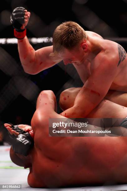 Alexander Volkov of Russia and Stefan Struve of the Netherlands compete in their Heavyweight bout during the UFC Fight Night at Ahoy on September 2,...