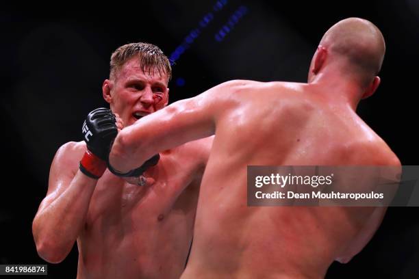 Alexander Volkov of Russia and Stefan Struve of the Netherlands compete in their Heavyweight bout during the UFC Fight Night at Ahoy on September 2,...