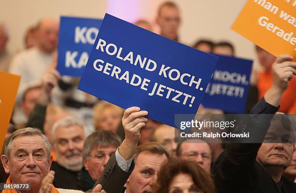 Supporters of Roland Koch, governor of the German state of Hesse and top candidate of the Christian Democraric Union Hesse for the Hesse elections...