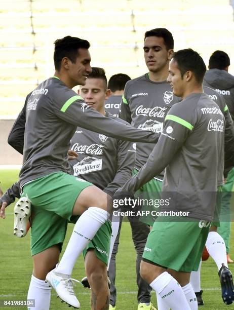 Bolivia players take part in a training session of the Bolivian national football team on September 2 in the Hernando Siles stadium in La Paz, ahead...