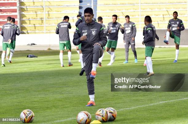 Raul Castro takes part in a training session of the Bolivian national football team on September 2 in the Hernando Siles stadium in La Paz, ahead of...