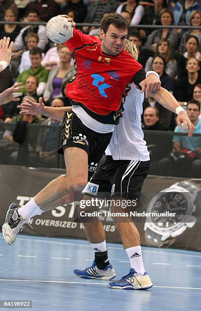 Markus Baur fights with the ball against Stefan Schroeder of Gemany during the Michael Bauer farwell match of the German National Team and Michael...