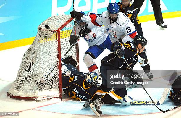 Bernd Bruckler of Espoo Blues and Jean-Guy Trudel of ZSC fight during the IIHF Champions Hockey League semi-final match between Espoo Blues and ZSC...