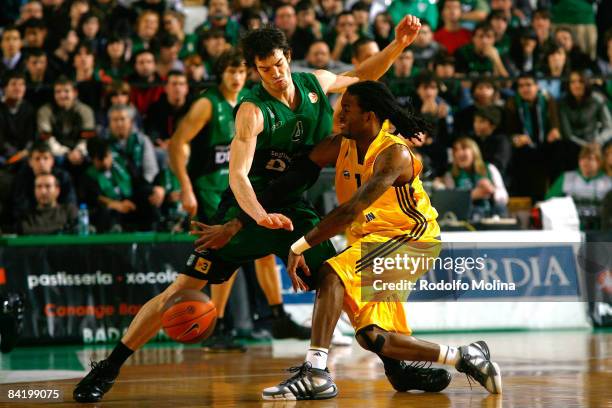 Julios Jenkins, #11 of Alba Berlin competes with Pau Ribas, #4 of DKV Joventut during the Euroleague Basketball Game 9 match between DKV Joventut and...