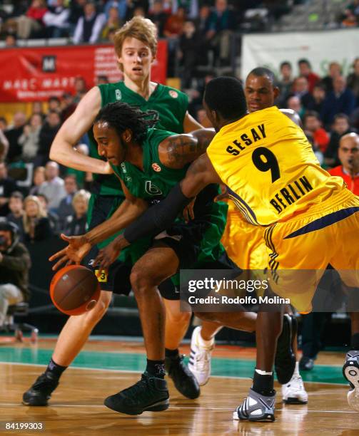 Bracey Wright, #6 of DKV Joventut competes with Ansu Sesay, #9 of Alba Berlin during the Euroleague Basketball Game 9 match between DKV Joventut and...