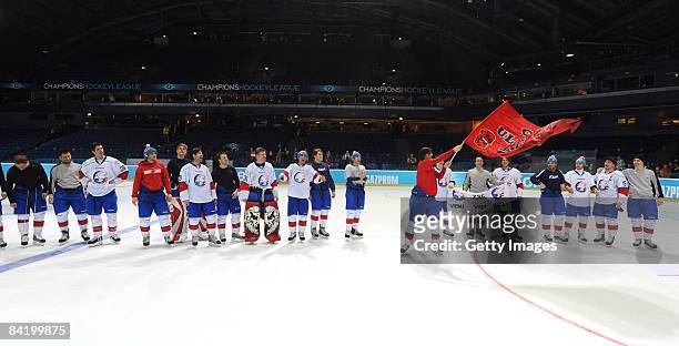 The ZSC team celebrates after winnig the semi-finals at the IIHF Champions Hockey League semi-final match between Espoo Blues and ZSC Lions Zurich at...