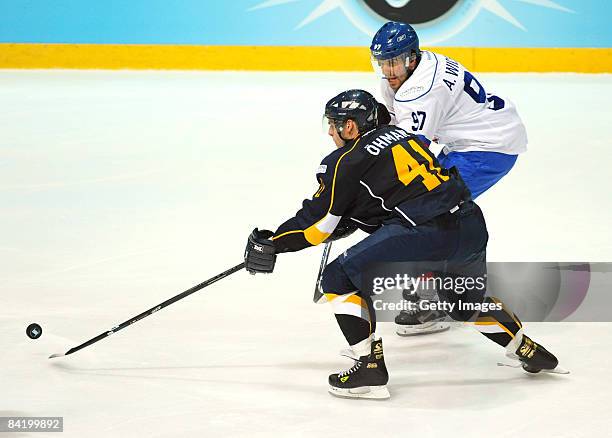 Stefan Ohman of Espoo Blues and Adrian Wichser of ZCS compete during the IIHF Champions Hockey League semi-final match between Espoo Blues and ZSC...