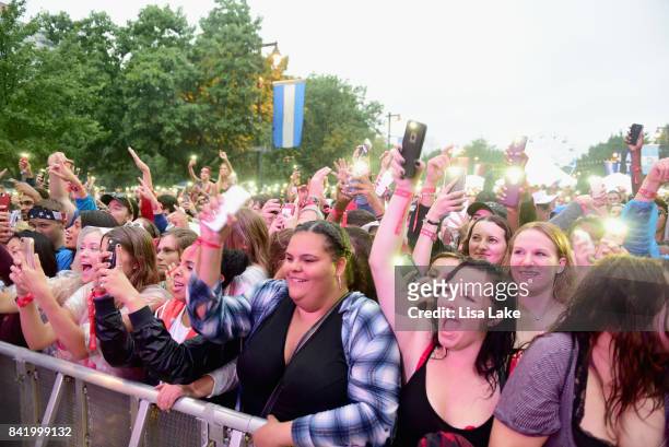 Music fans in panchos attend the 2017 Budweiser Made in America festival - Day 1 at Benjamin Franklin Parkway on September 2, 2017 in Philadelphia,...