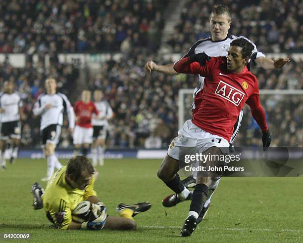 Nani of Manchester United clashes with Roy Carroll of Derby County during the Carling Cup Semi-Final First Leg match between Derby County and...