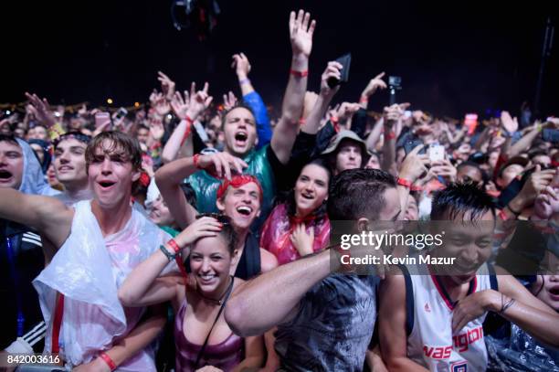 Music fans react in the crowd as Kaskade performs onstage during the 2017 Budweiser Made in America festival - Day 1 at Benjamin Franklin Parkway on...