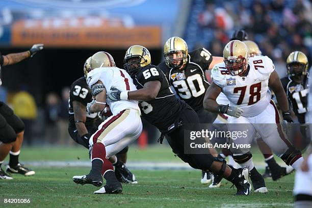 Greg Billinger of the Vanderbilt Commodores tackles Josh Haden of the Boston College Eagles during the Gaylord Hotels Music City Bowl at LP Field on...