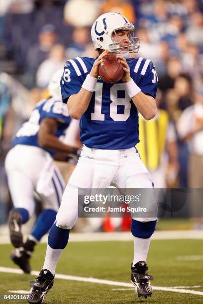 Peyton Manning of the Indianapolis Colts looks to pass the ball during the game against the Tennessee Titans on December 28, 2008 at Lucas Oil...