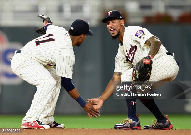 Jorge Polanco and Byron Buxton of the Minnesota Twins celebrate winning against the Kansas City Royals after the game on September 2, 2017 at Target...