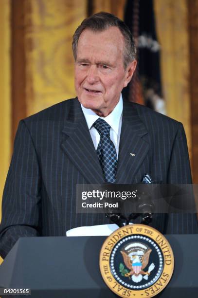 Former U.S. President George H. W. Bush speaks during the reception in honor of the Points of Light Institute at the East Room of the White House...