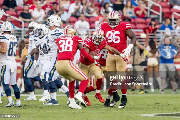 San Francisco 49ers Cornerback Asa Jackson celebrates his interception with teammates during the NFL preseason game between the Los Angeles Chargers...