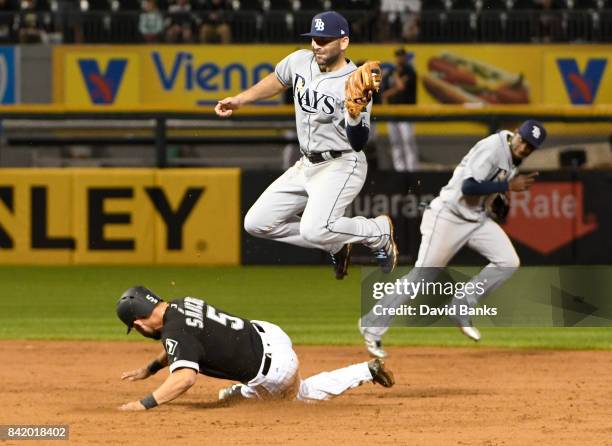 Yolmer Sanchez of the Chicago White Sox steals second base as Danny Espinosa of the Tampa Bay Rays takes the throw during the seventh inning on...