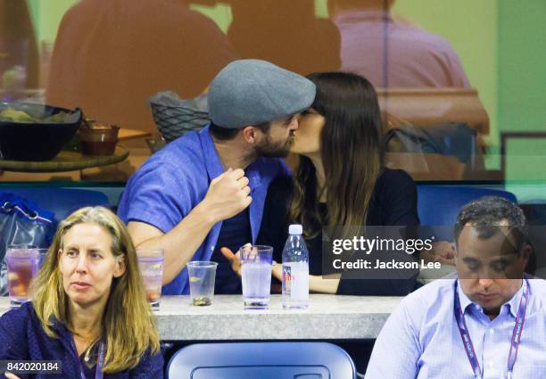 Justin Timberlake and Jessica Biel kiss while attending the 2017 US Open Tennis Championships Federer vs. Lopez at Arthur Ashe Stadium on September...