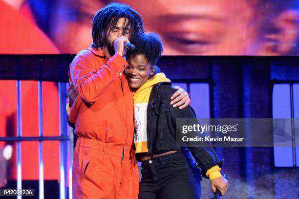 Cole and Ari Lennox perform onstage during 2017 Budweiser Made in America - Day 1 at Benjamin Franklin Parkway on September 2, 2017 in Philadelphia,...