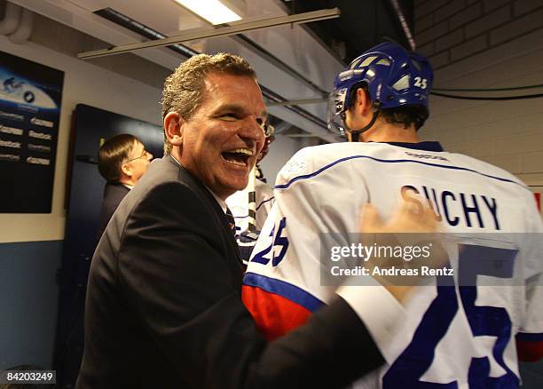 Coach Sean Simpson celebrates with Radoslav Suchy of Lions Zurich after the IIHF Champions Hockey League semi-final match between Espoo Blues and ZSC...