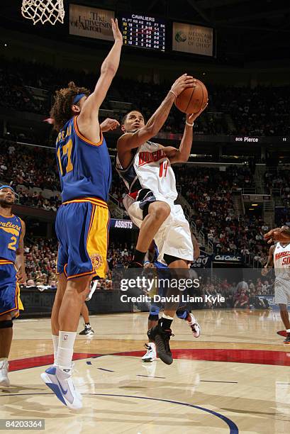 Augustin of the Charlotte Bobcats goes up for the shot against Anderson Varejao of the Cleveland Cavaliers at the Quicken Loans Arena January 7, 2009...