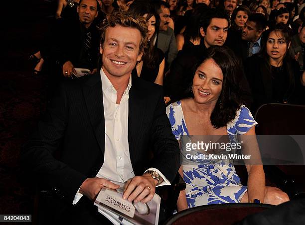 Actor Simon Baker and actress Robin Tunney pose in the audience during the 35th Annual People's Choice Awards held at the Shrine Auditorium on...