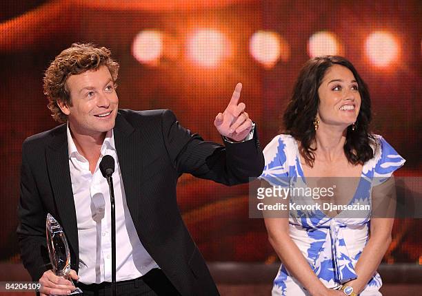 Actor Simon Baker and actress Robin Tunney accept the Favorite New TV Drama award for The Mentalist during the 35th Annual People's Choice Awards...