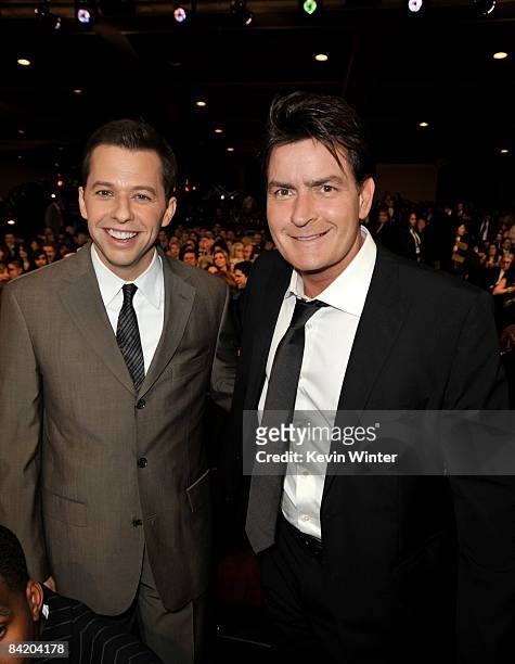 Actors Jon Cryer and Charlie Sheen pose in the audience during the 35th Annual People's Choice Awards held at the Shrine Auditorium on January 7,...
