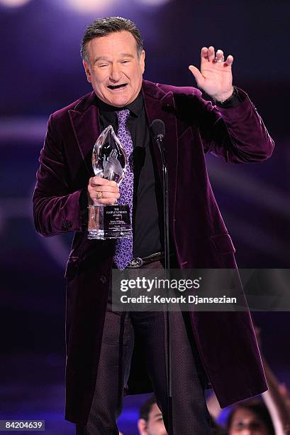 Actor Robin Williams accepts the Favorite Scene Stealing Guest Star award during the 35th Annual People's Choice Awards held at the Shrine Auditorium...